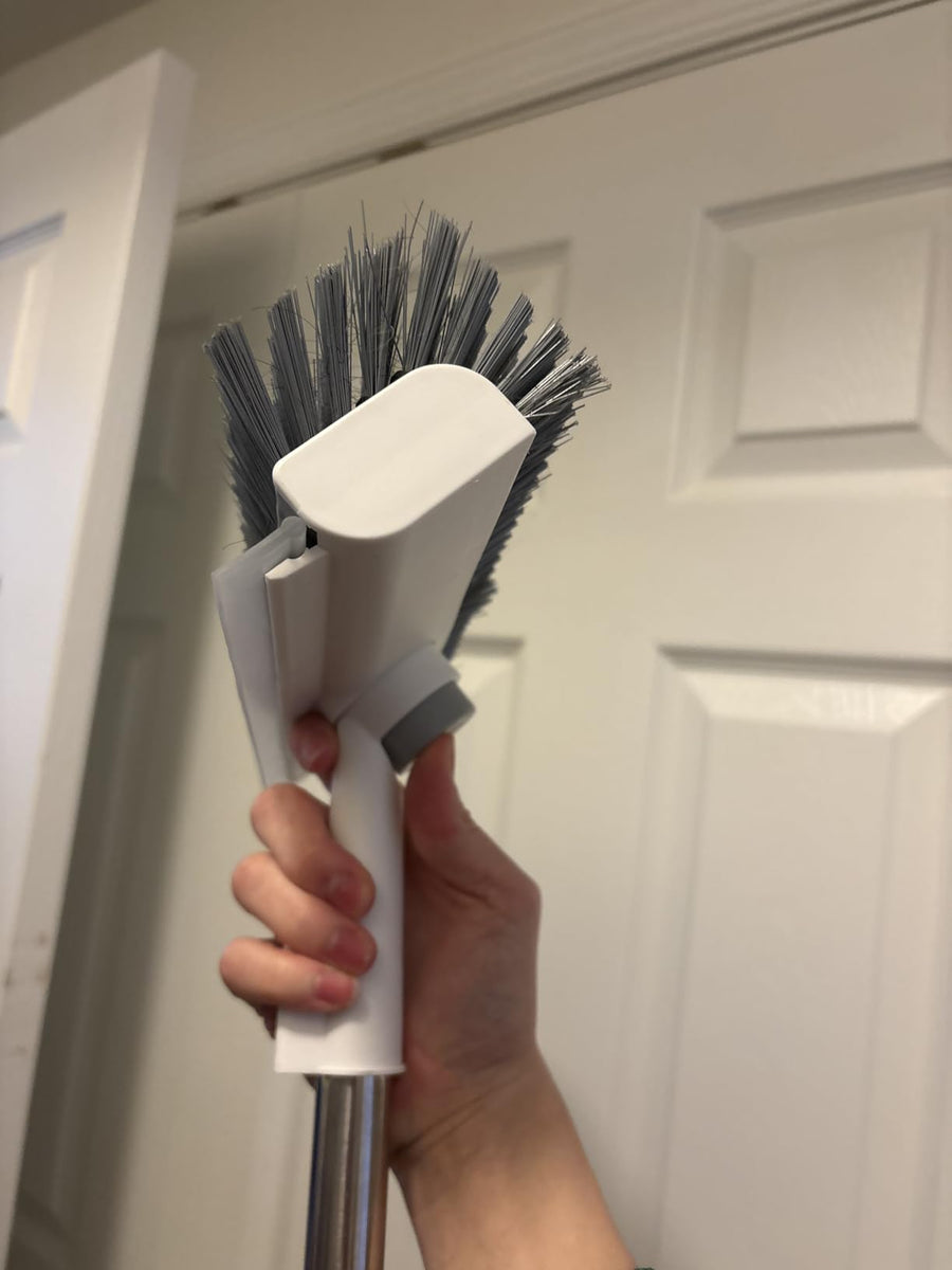 Halden brush cleaning a kitchen floor
