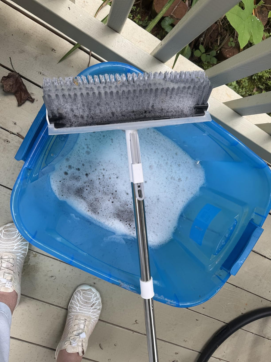 Halden brush cleaning an entryway